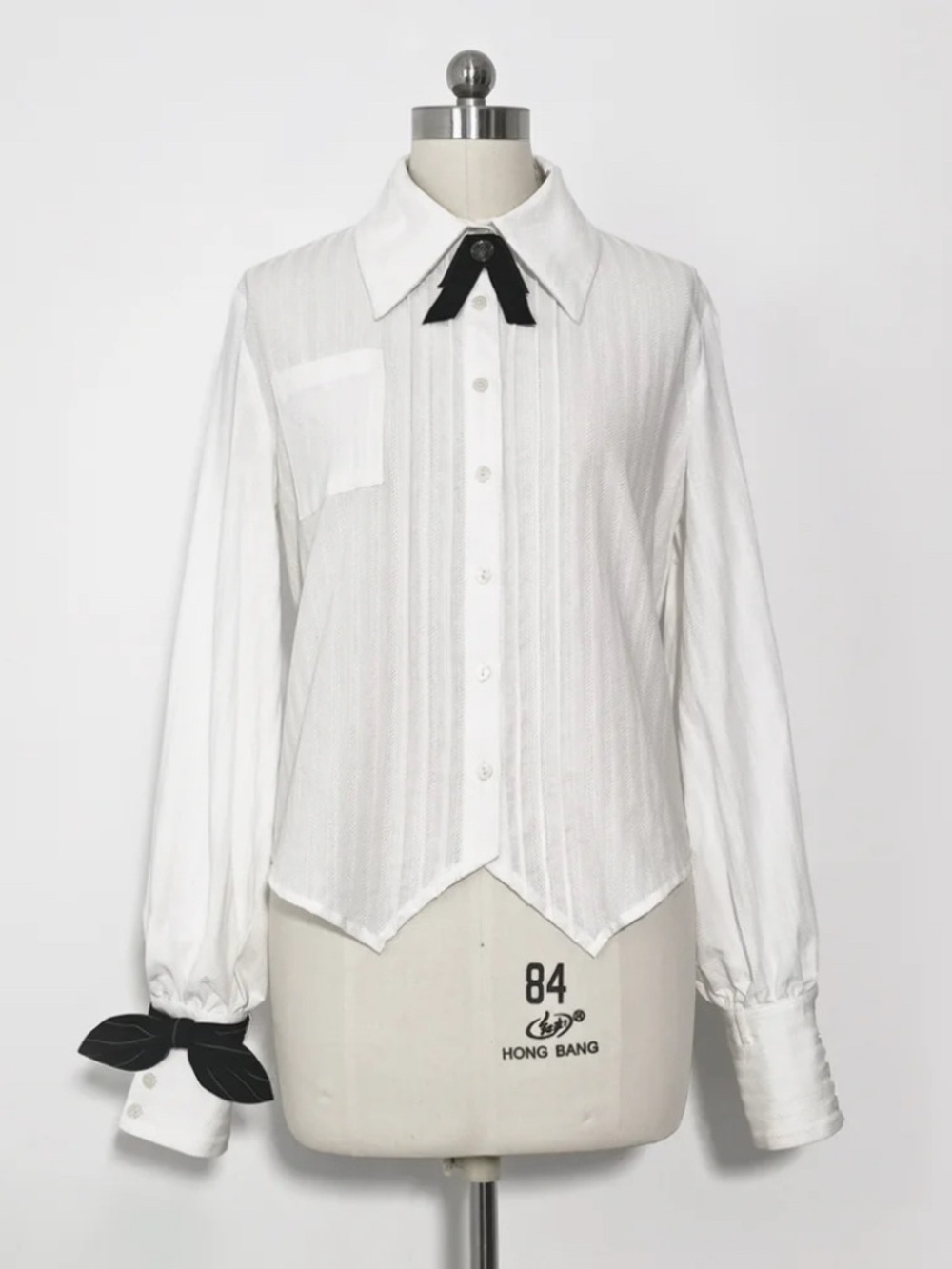 White Button-Front Blouse with Black Bow Accents